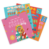 Four colorful sticker activity book covers fanned out on a white background. The front cover is pink and reads 'Catholic Family Crate Pray By Sticker Mary,' with illustrated Mary and baby Jesus.
