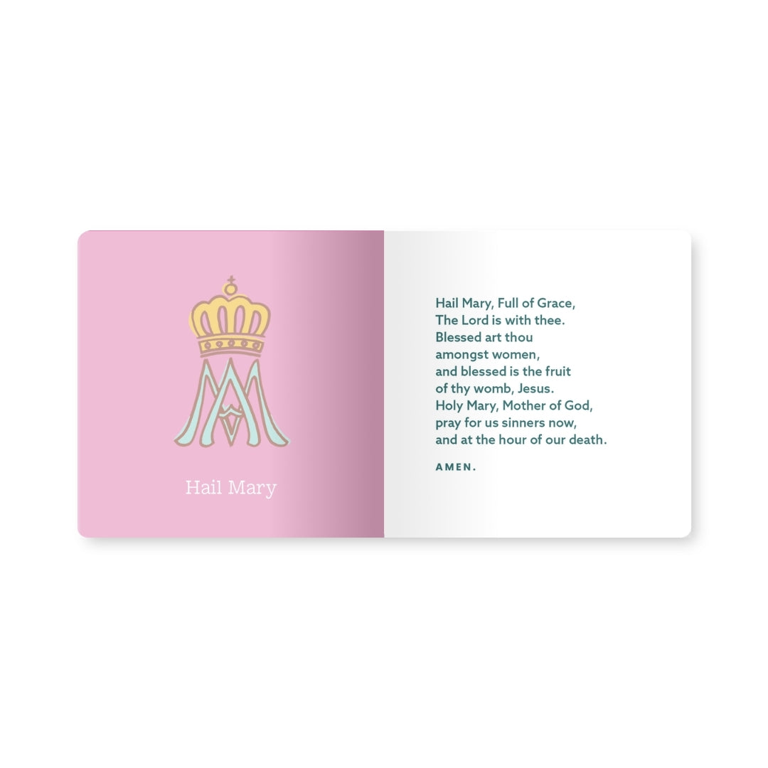 Hail Mary prayer page with a pink Marian monogram illustration