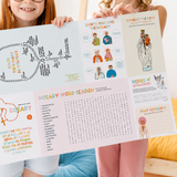 Two girls holding up the 24 x 18 inch Rosary Jumbo Activity Sheet